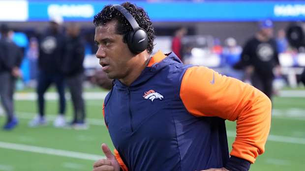 Denver Broncos quarterback Russell Wilson wears Bose headphones before the game against the Los Angeles Rams at SoFi Stadium.